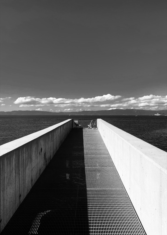Wooden pier or walkway extending into the sea in Trondheim